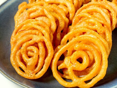 Jalebi served in a blue plate