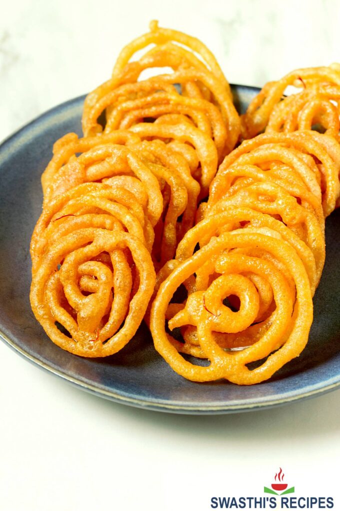 Jalebi served in a blue plate