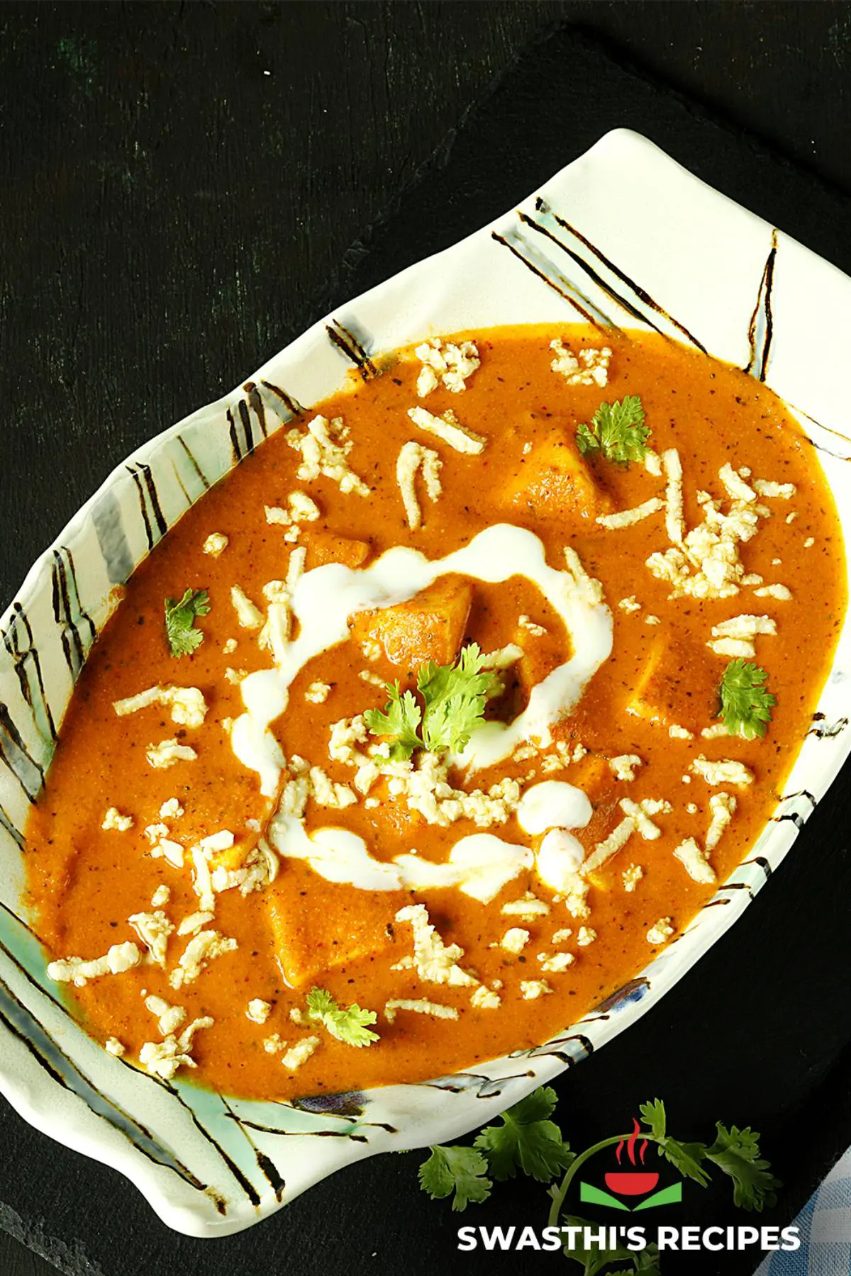 Paneer lababdar served in a white bowl