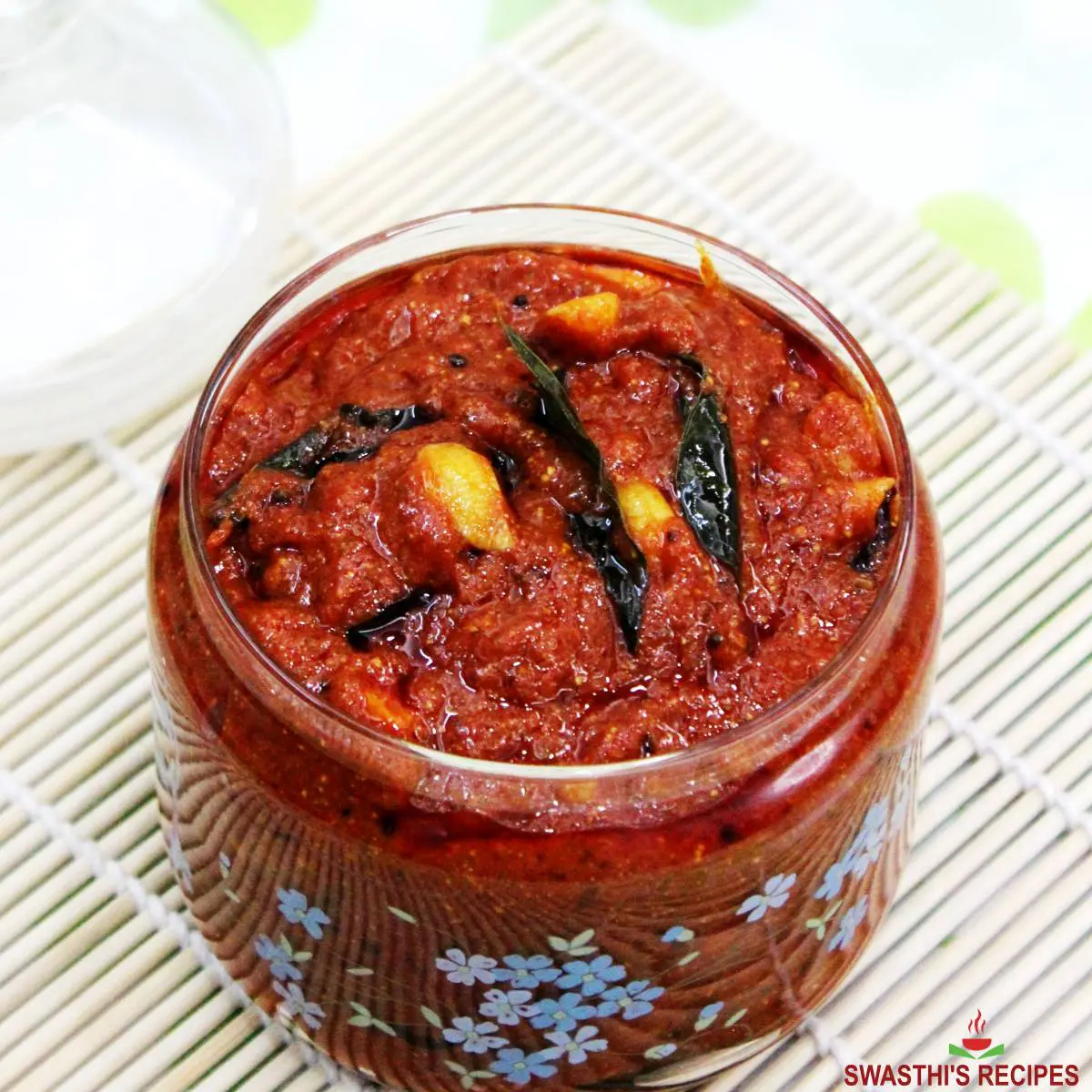 Tomato pickle made in Andhra style with ripe tomatoes, tamarind and spices.