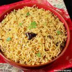 Biryani Rice also known as Kuska served in a red bowl