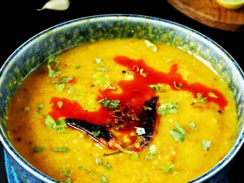 Masoor dal is red lentils cooked with spices