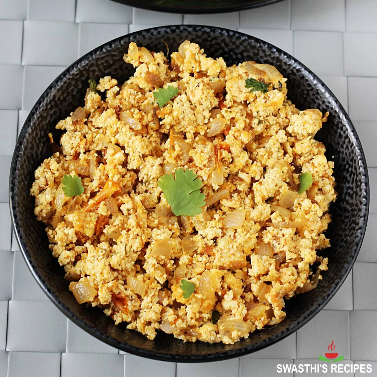 Paneer bhurji recipe made with Indian cheese, spices and herbs