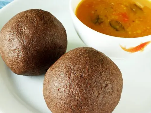 Ragi mudde served in a white plate