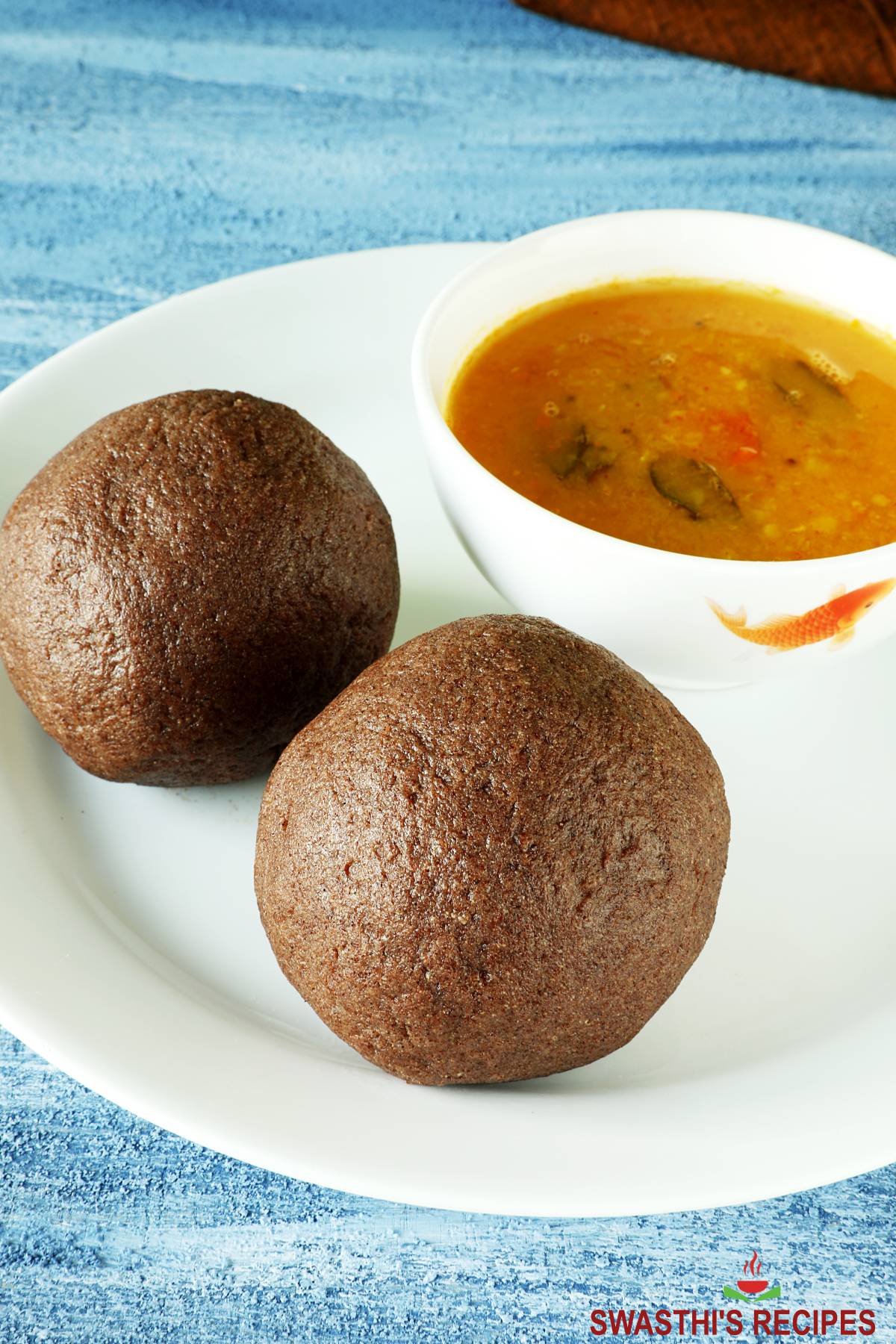 Ragi mudde served in a white plate