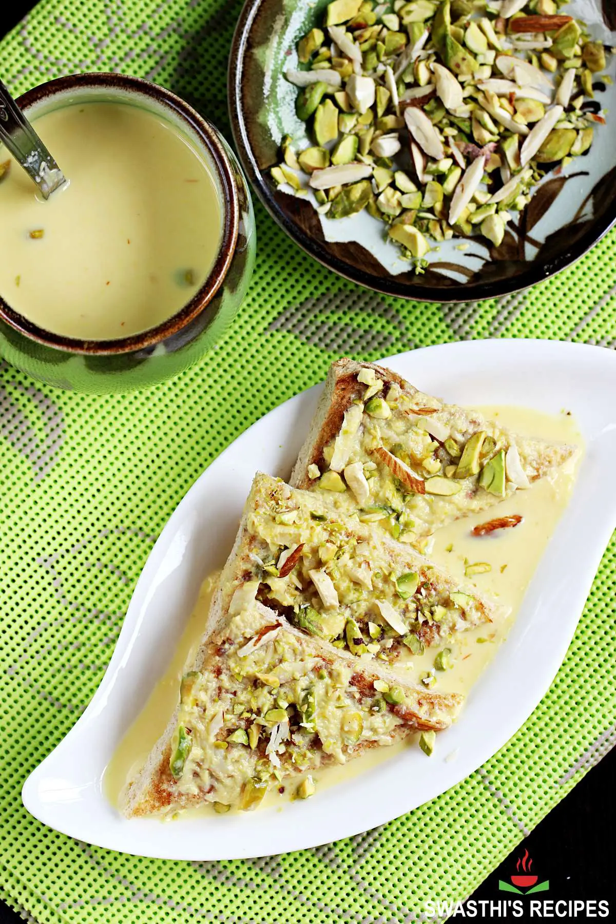 Shahi tukda also known as shahi tukra served in a white plate