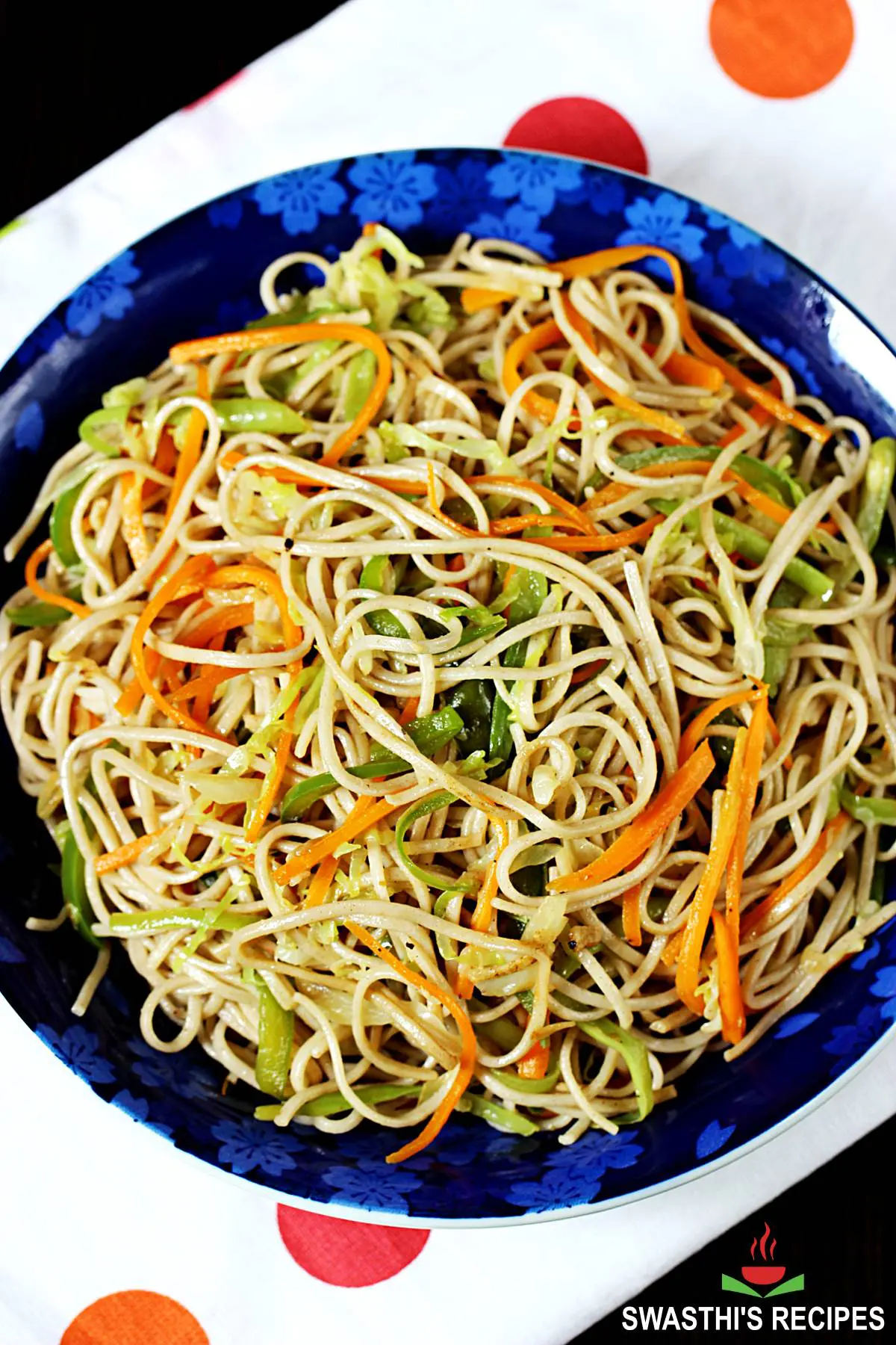 Veg noodles aka vegetable noodles served in a blue bowl