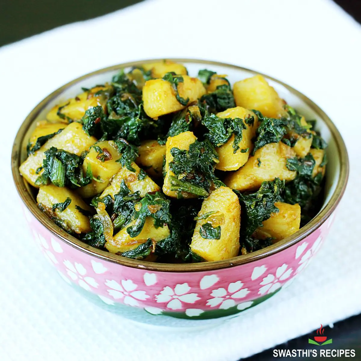 Aloo palak is spinach potatoes made in Indian style