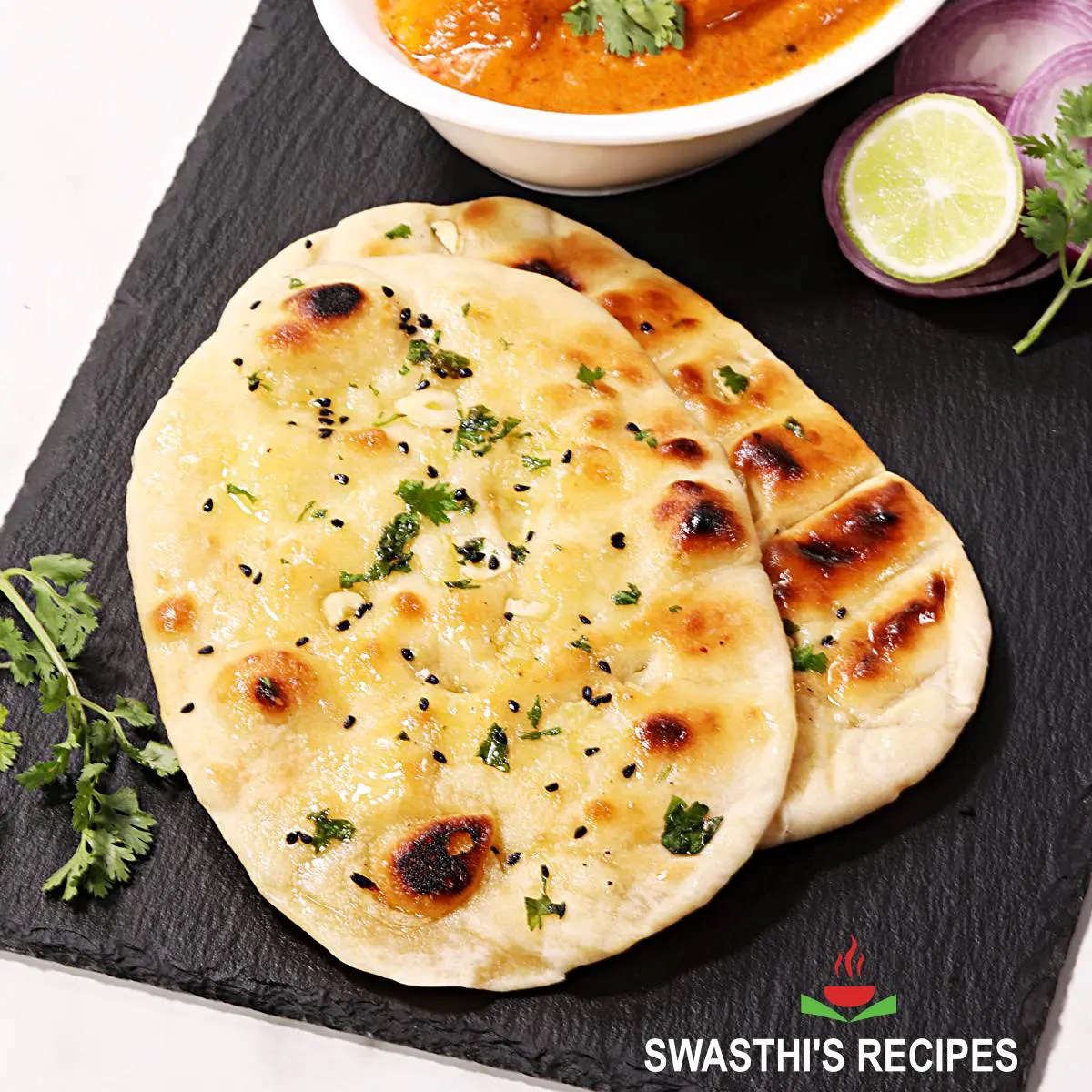 Butter Naan Recipe made with flour, baking powder, baking soda and yogurt