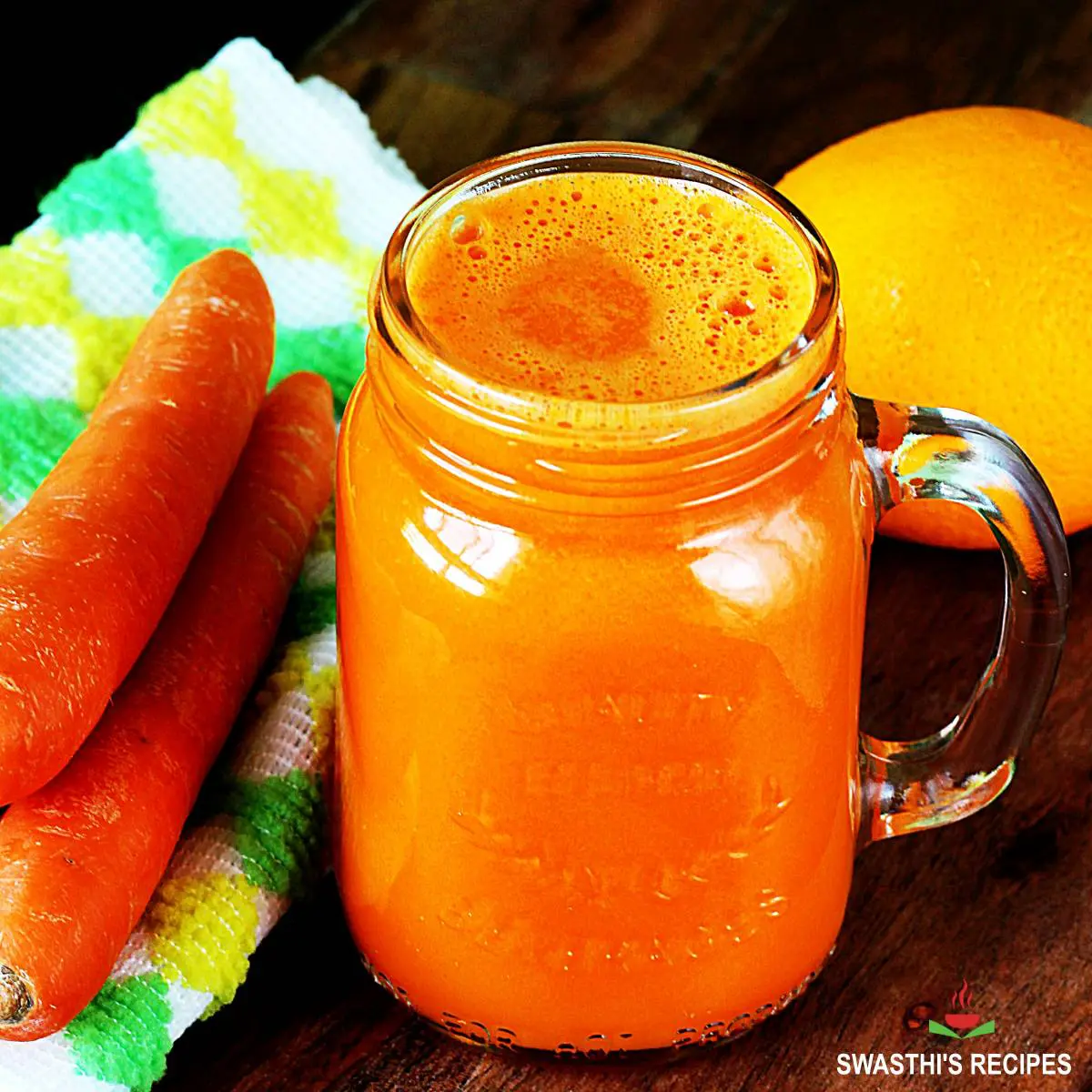 Carrot juice served in a mason jar