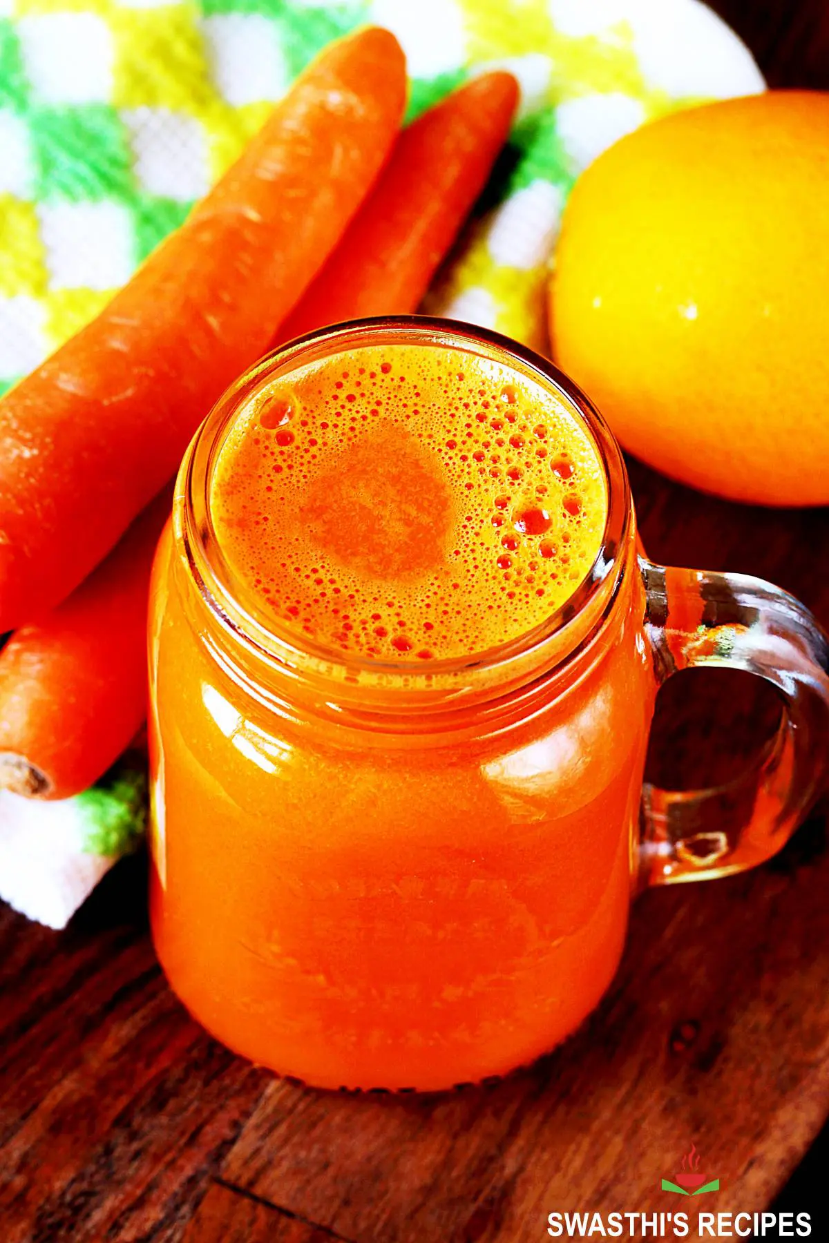 Carrot juice made with fresh carrots, oranges and ginger