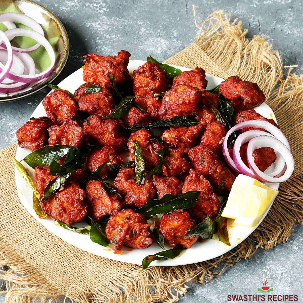 https://www.indianhealthyrecipes.com/wp-content/uploads/2022/03/chicken-65-restaurant-style.jpg.webp