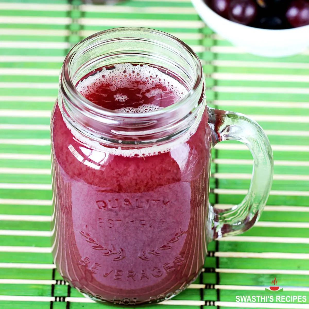 Grape juice served in mason jar