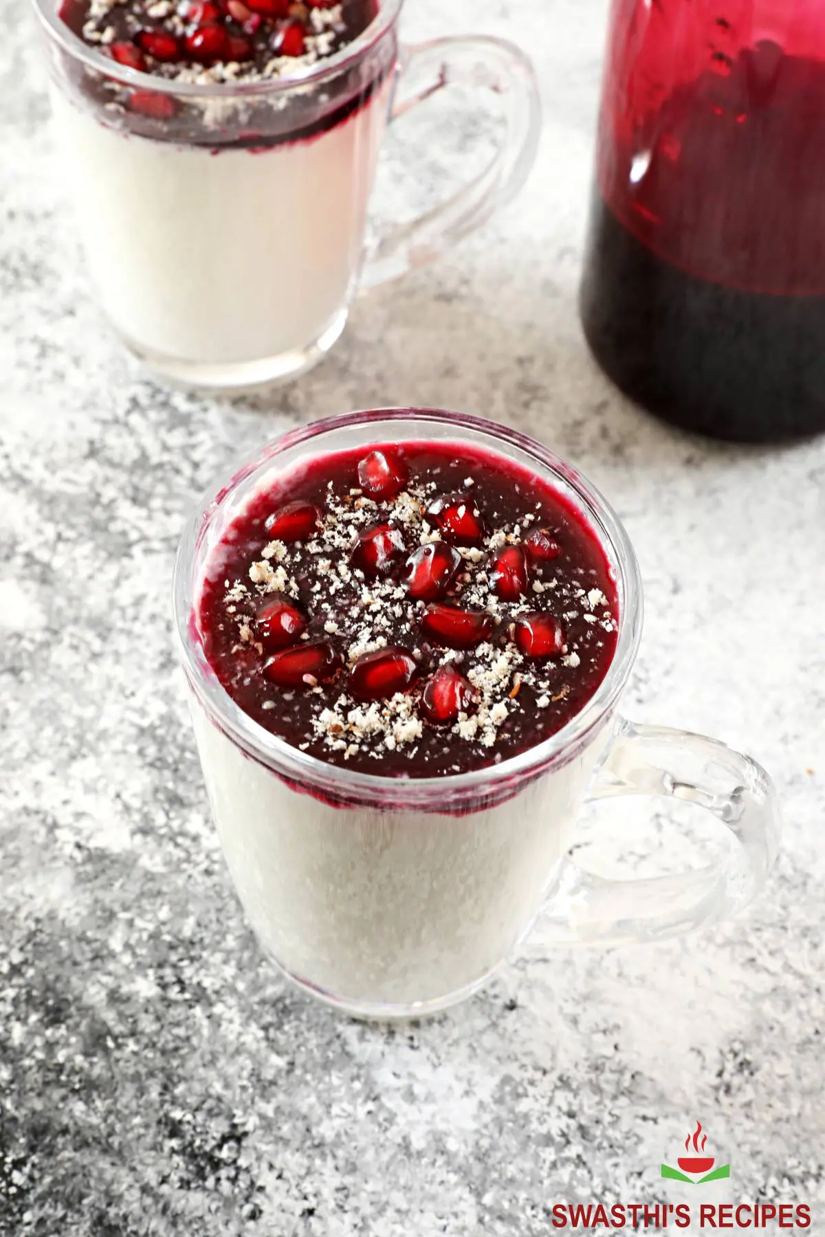 pomegranate molasses served as a topping over panna cotta