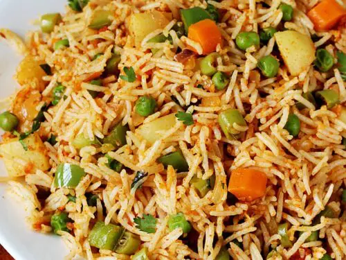 tawa pulao made with rice, vegetables and spices