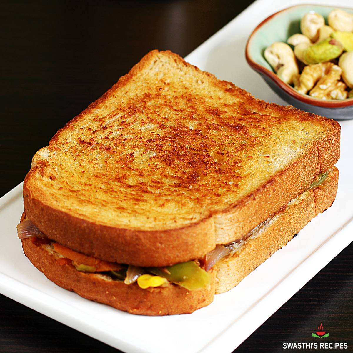 https://www.indianhealthyrecipes.com/wp-content/uploads/2022/03/veg-sandwich-vegetable-sandwich.jpg