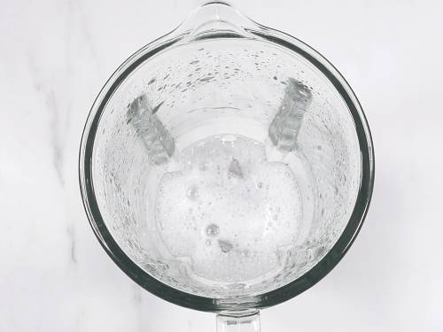 frothy aloe vera gel in a blender