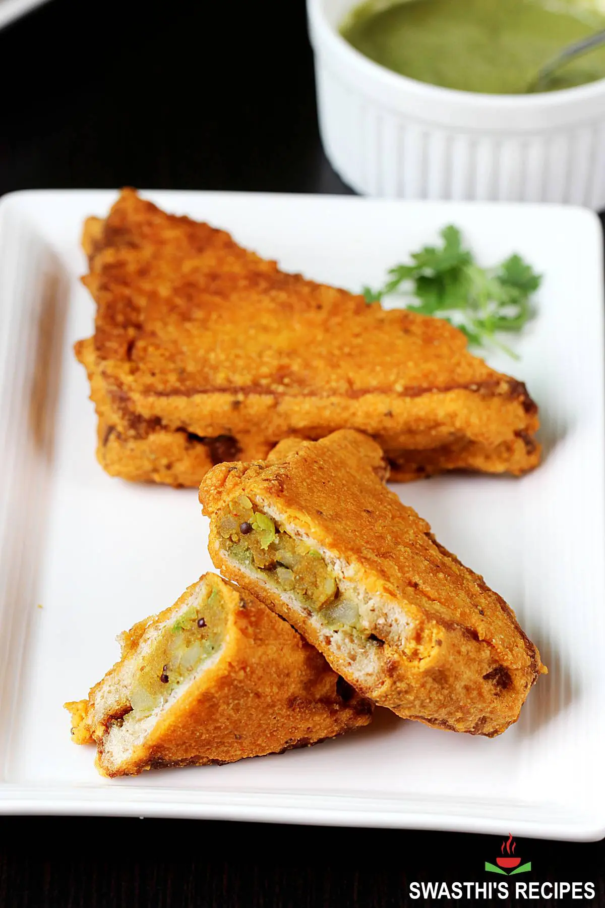 Bread pakora served in a white plate