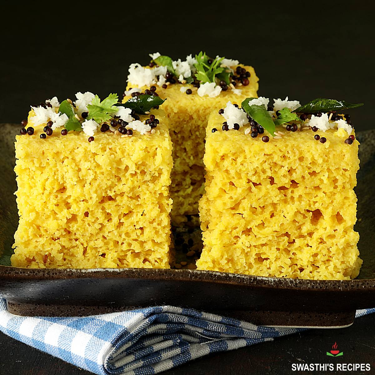 Khaman dhokla recipe made with gram flour yogurt and tempering spices