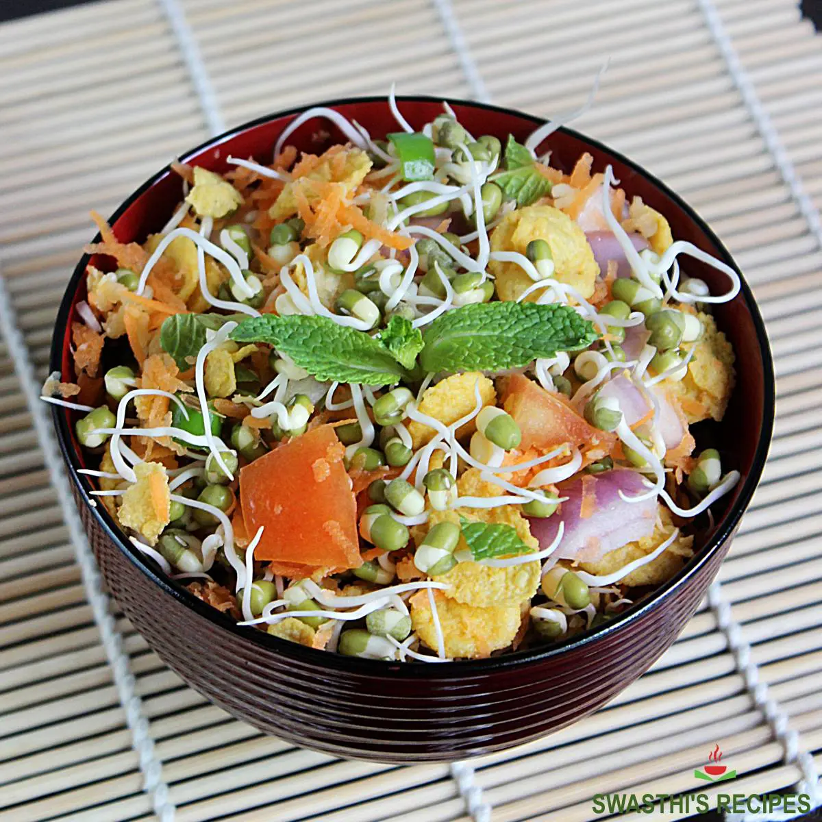 Sprouts salad made with green gram sprouts vegetables and herbs