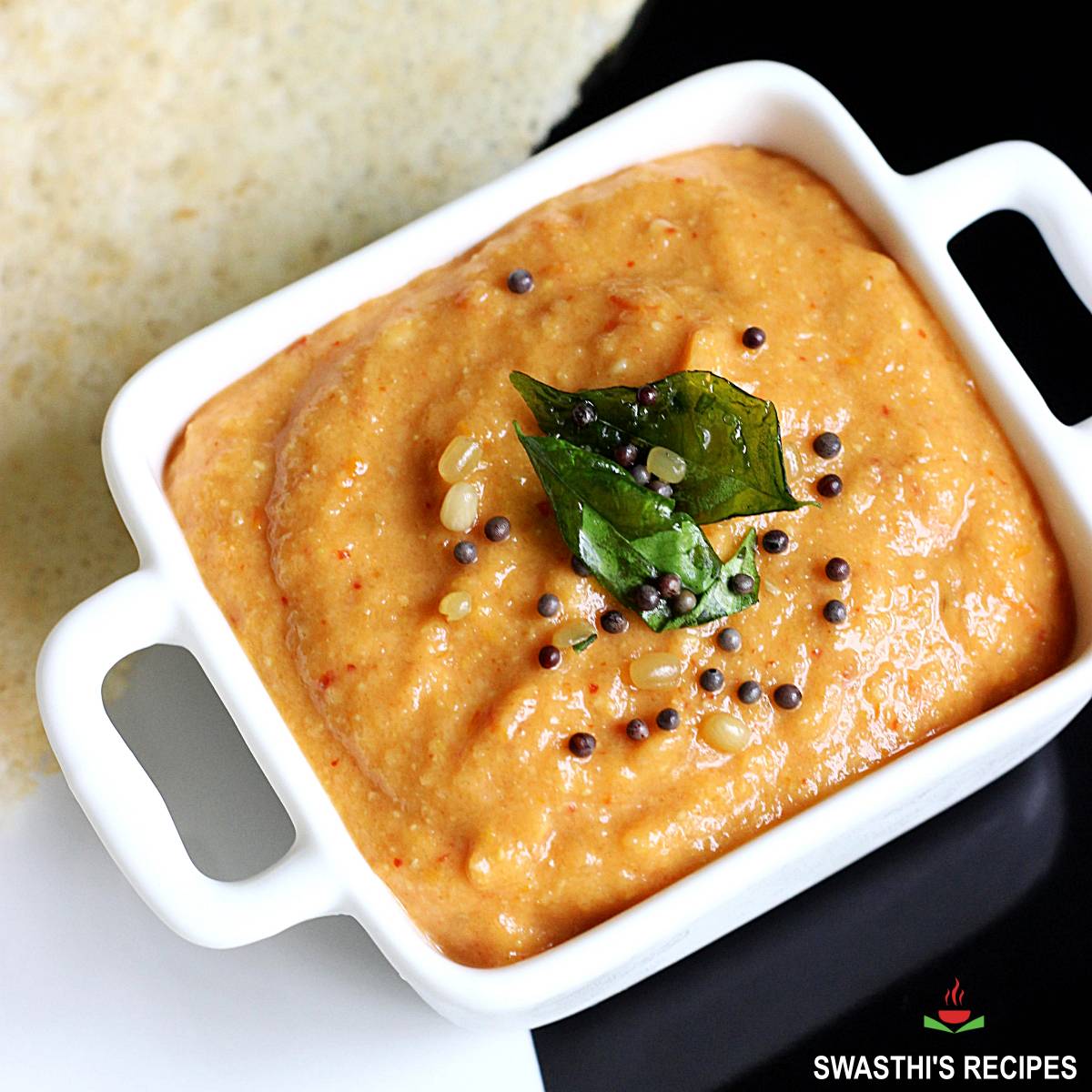 Tomato chutney made with ripe tomatoes, spices and herbs