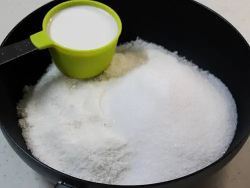 coconut milk and sugar in a pan