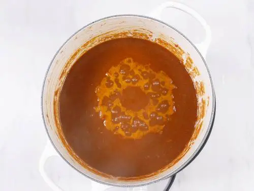 simmering tikka masala in a pan