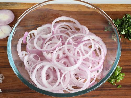 onion rings in a bowl to make salad