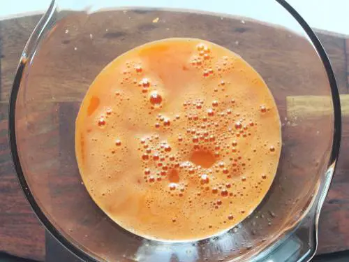 strained carrot juice made in a bowl
