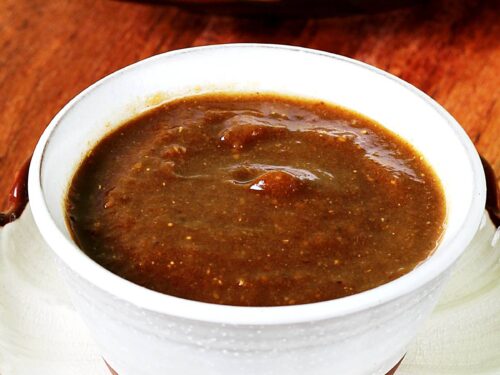 tamarind chutney also known as imli chutney served in a bowl