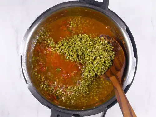 green gram with water in a pot
