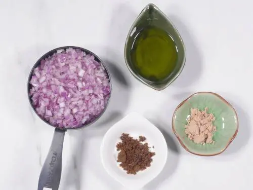 chopped onions & oil in a bowl