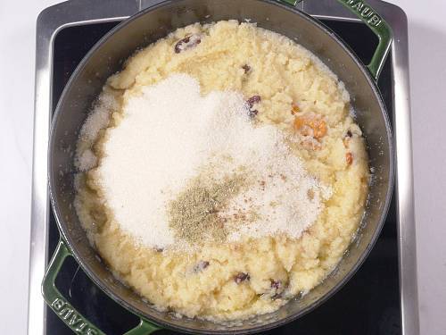 add sugar and cardamoms