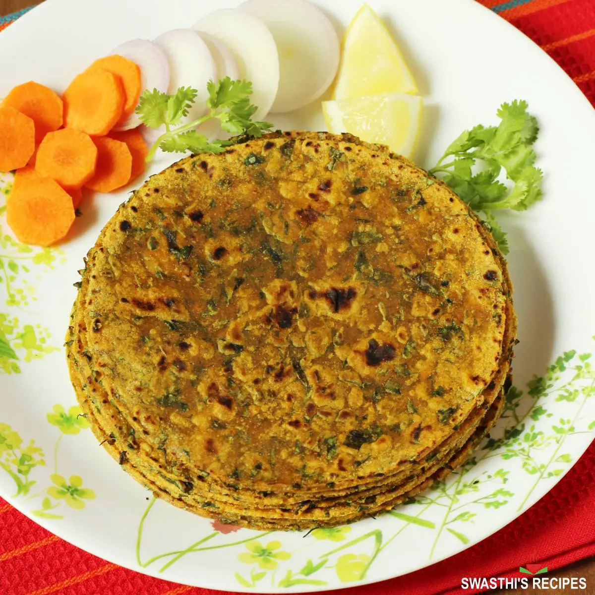 Thepla recipe made with whole grain flour, spices, methi leaves and herbs