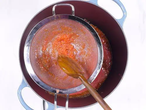 pass tomato puree through strainer