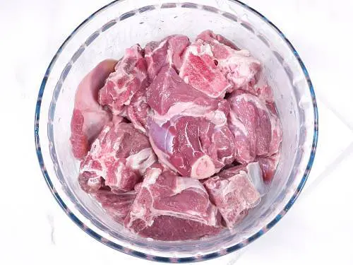 bone-in lamb ready in a bowl