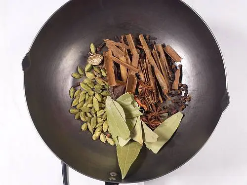 toasting whole spices to make garam masala