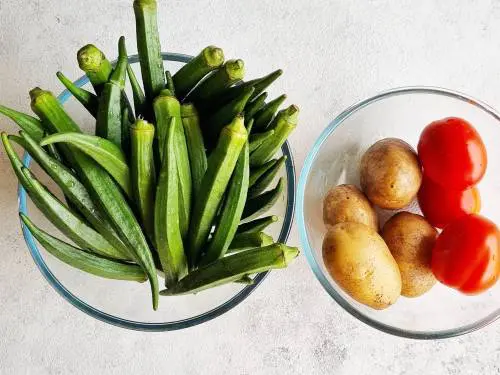 rinsed okra potatoes and tomatoes 