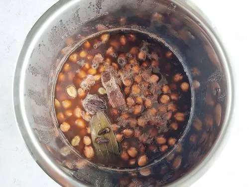 darker chole cooked in tea decoction