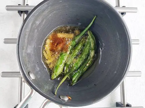hing tadka in a pan