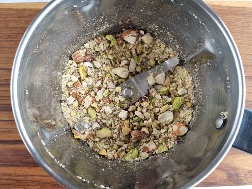 powder the nuts to make pinni