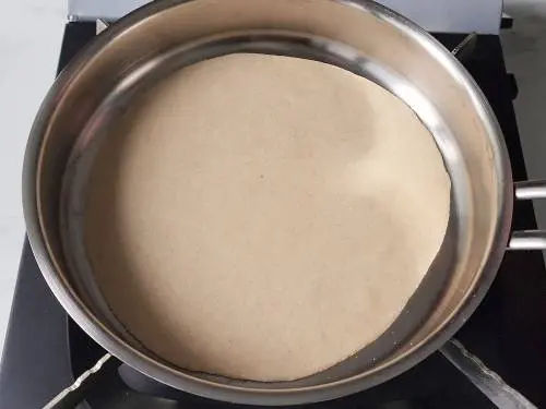 place the tandoori roti in a pan