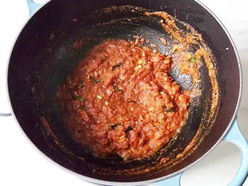 onion tomato masala in a pan