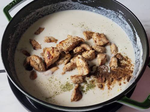 spices and pan-fried chicken to make malai chicken