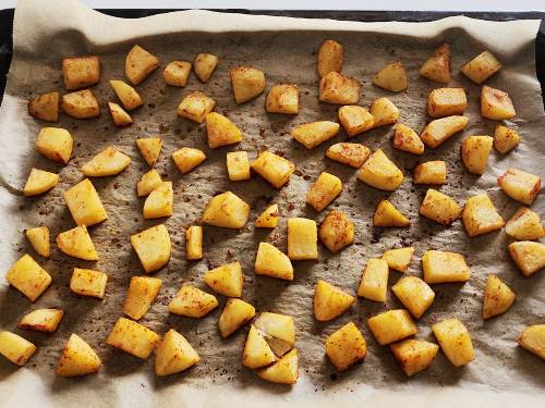 spiced baked aloo in a tray