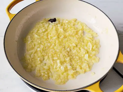 saute onions in ghee for lamb karahi