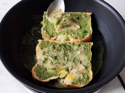 pour egg on the masala french toast