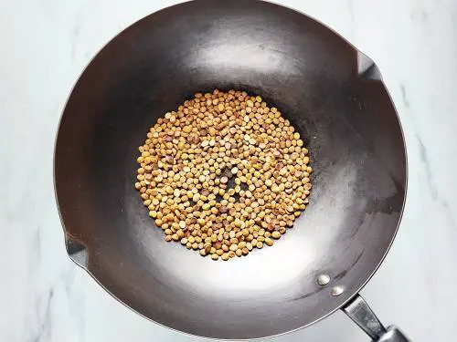 toasting chana dal in a pan