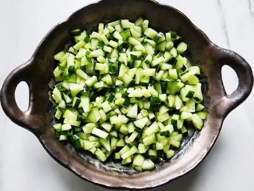 chopped cucumbers in a bowl