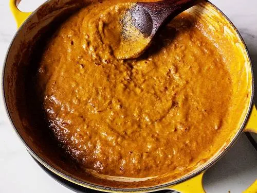 onion tomato masala in a pan